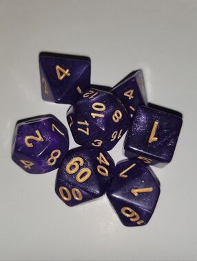 Shimmering Purple RPG Dice Set with Gold Numbers